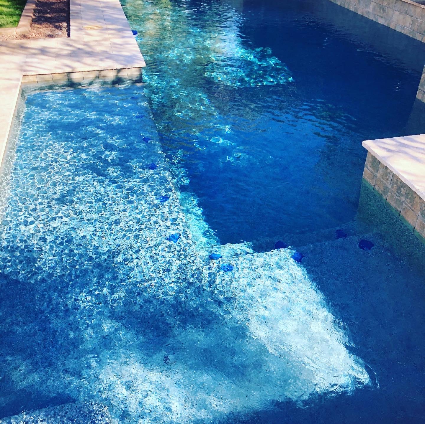 Clear blue waters in a pool